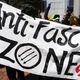 Anti-fascist protestors gather as right-wing rally organizer, Patriot Prayer founder and Republican Senate candidate Joey Gibson speaks during a campaign rally for Gibson in Portland, Oregon, August 4, 2018.